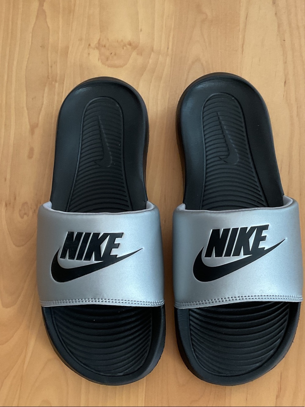 Nike Silver and Black Slide Sandals with Bold Logo